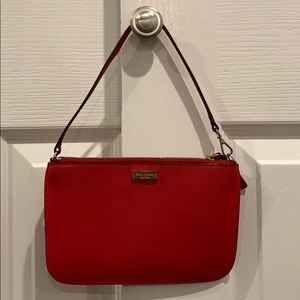 Red Kate spade wrist bag